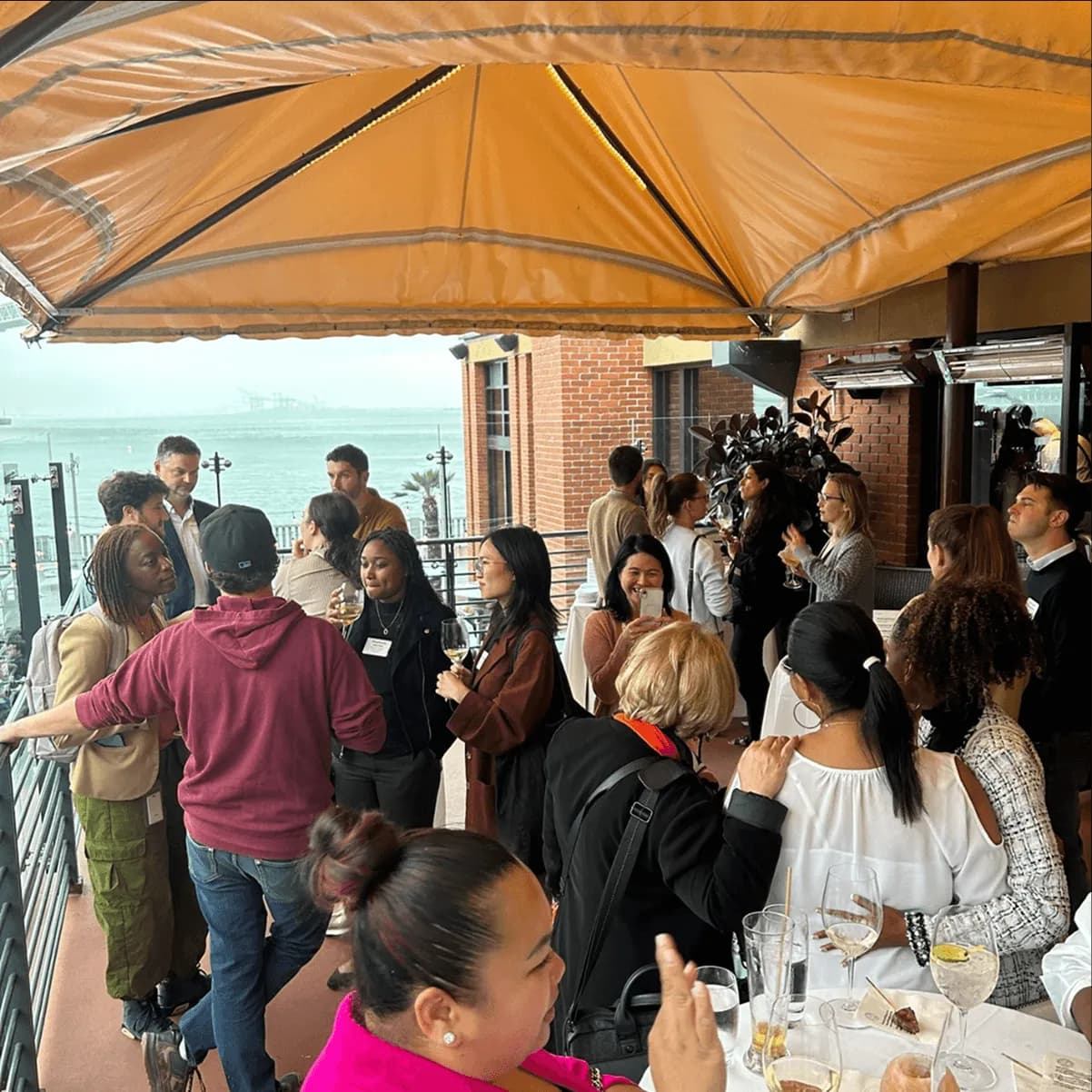 This is an example of a happy hour event hosted at a popular local restaurant and bar in San Francisco for a FinTech SaaS startup.